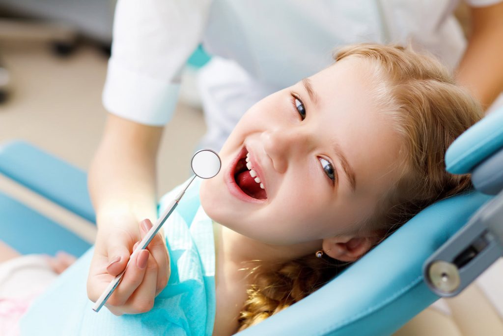 The Pediatric Dentists - Small Child in Chair